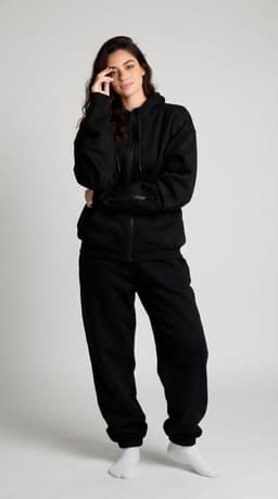 Black oversized zip-up hoodie — styled view